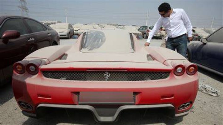 Why are luxury cars abandoned in Dubai?